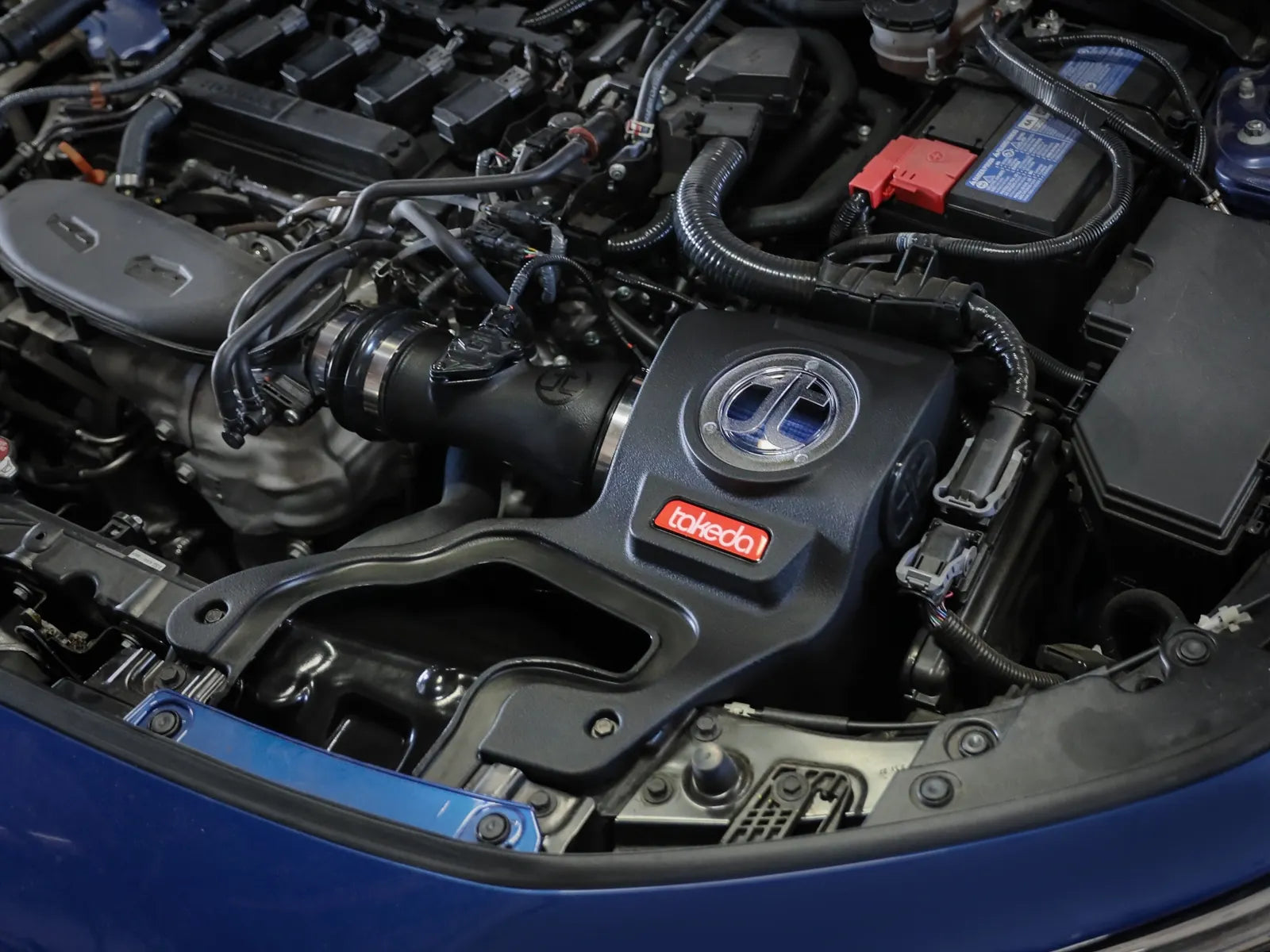 aFe - 22-23 Honda Civic L4 1.5L (t) Takeda Momentum Cold Air Intake System w/ Pro 5R Filter inside engine bay on Bolt Motorsports
