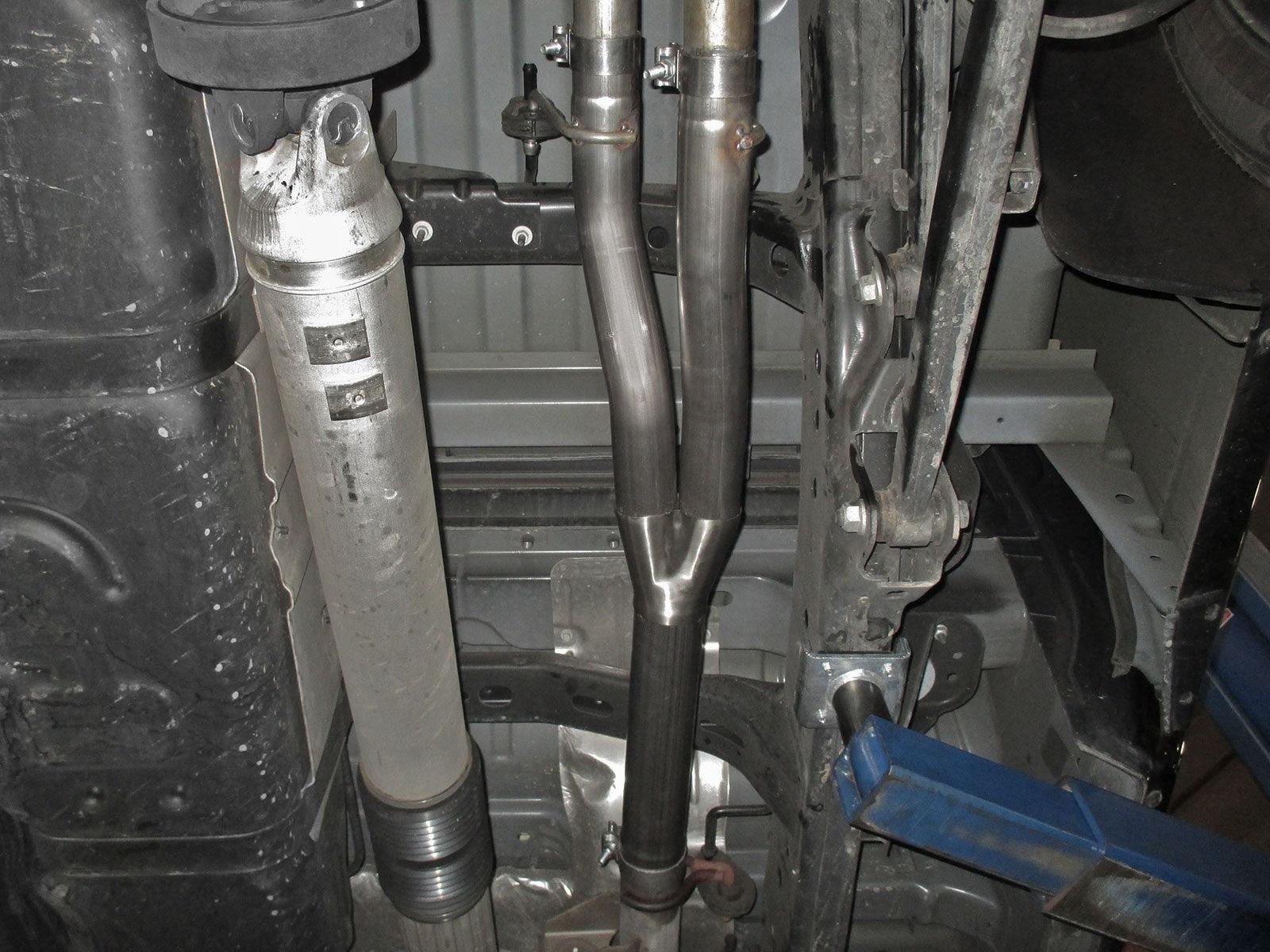 aFe Apollo GT Series 409 Stainless Steel Muffler Delete Pipe 09-19 Ram 1500 (Dual Exhaust) V8-5.7L installed under car view on Bolt Motorsports