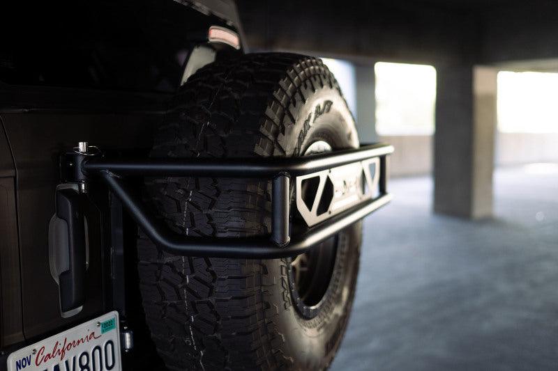 DV8 Offroad 21-23 Ford Bronco Spare Tire Guard & Accessory Mount - BOLT Motorsports