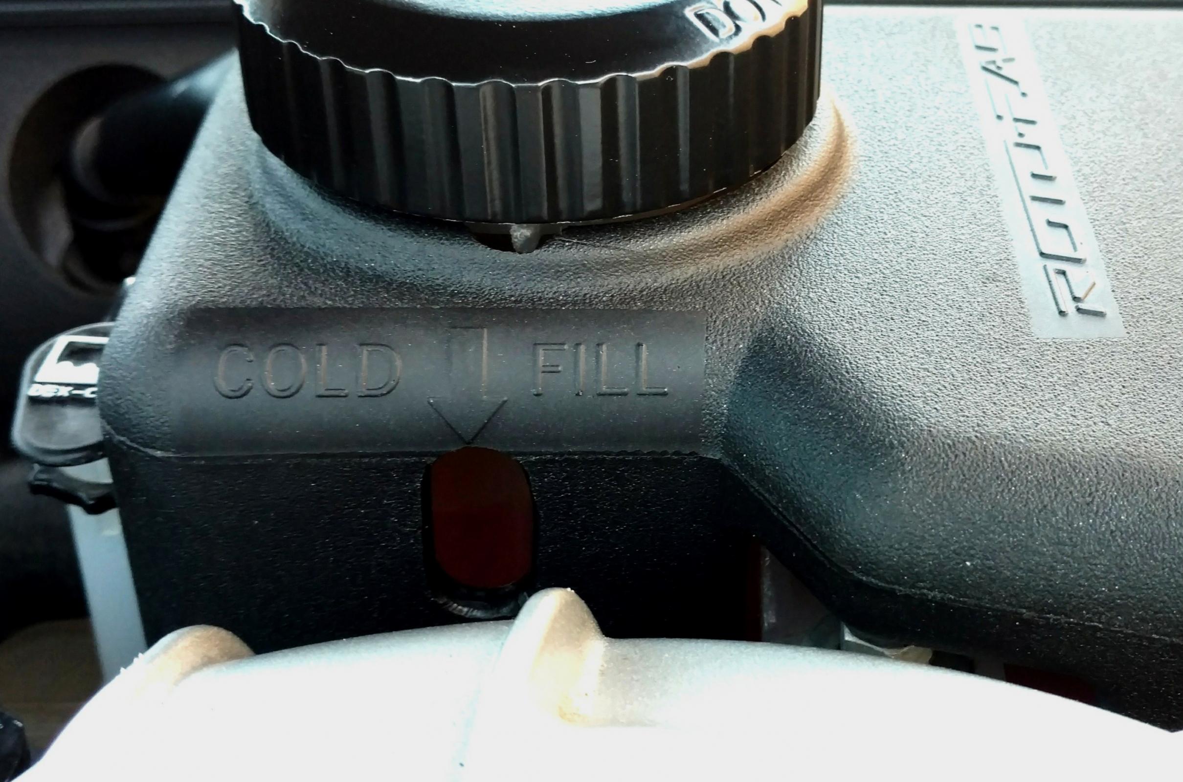 2016-23 Camaro Coolant Reservoir Cover inside engine bay close up on Bolt Motorsports