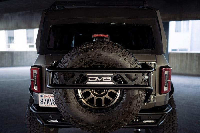 DV8 Offroad 21-23 Ford Bronco Spare Tire Guard & Accessory Mount - BOLT Motorsports