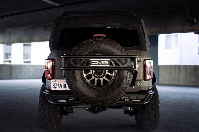 DV8 Offroad 21-23 Ford Bronco Spare Tire Guard & Accessory Mount - BOLT Motorsports