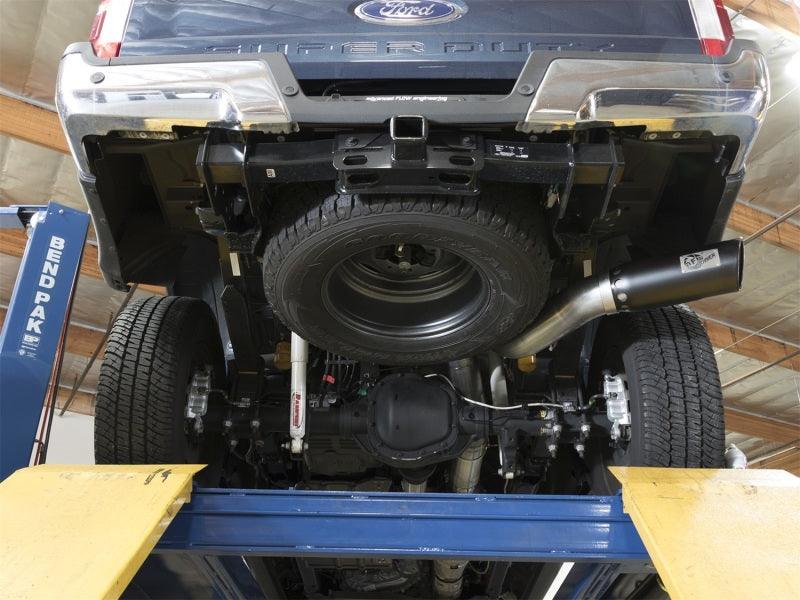 aFe ATLAS 5in DPF-Back Alum Steel Exhaust System w/Black Tip 2017 Ford Diesel Trucks V8-6.7L (td) installed under car view on Bolt Motorsports