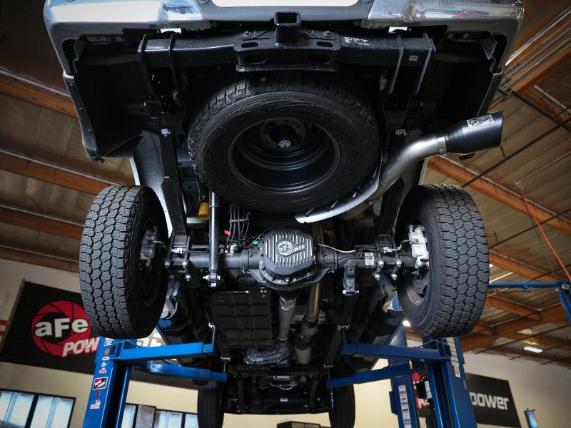 aFe Apollo GT Series 3-1/2in 409 SS Axle-Back Exhaust 17-20 Ford F-250/F-350 Polished Tip No Muffler installed under car view on Bolt Motorsports
