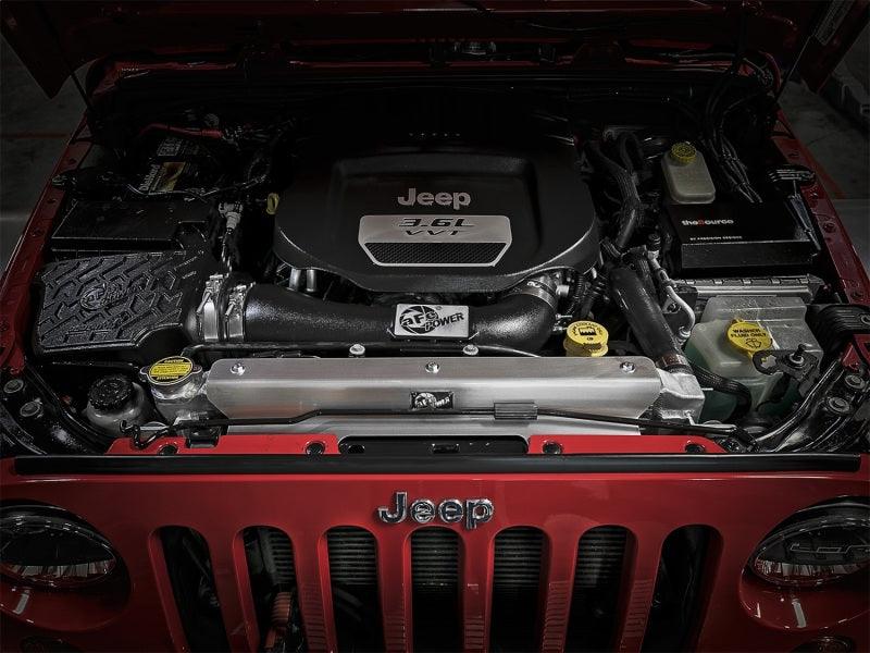 aFe BladeRunner GT Series Bar and Plate Radiator w/ Black Hoses 12-18 Jeep Wrangler (JK) V6 3.6L inside engine bay on Bolt Motorsports
